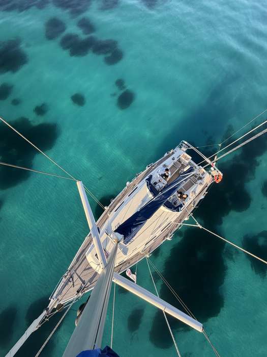 Aerial view of the Sinbad sailboat in turquoise water